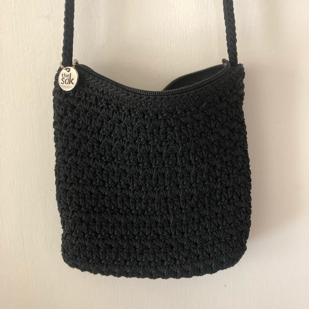The Sak crossbody crocheted lined bag. Used